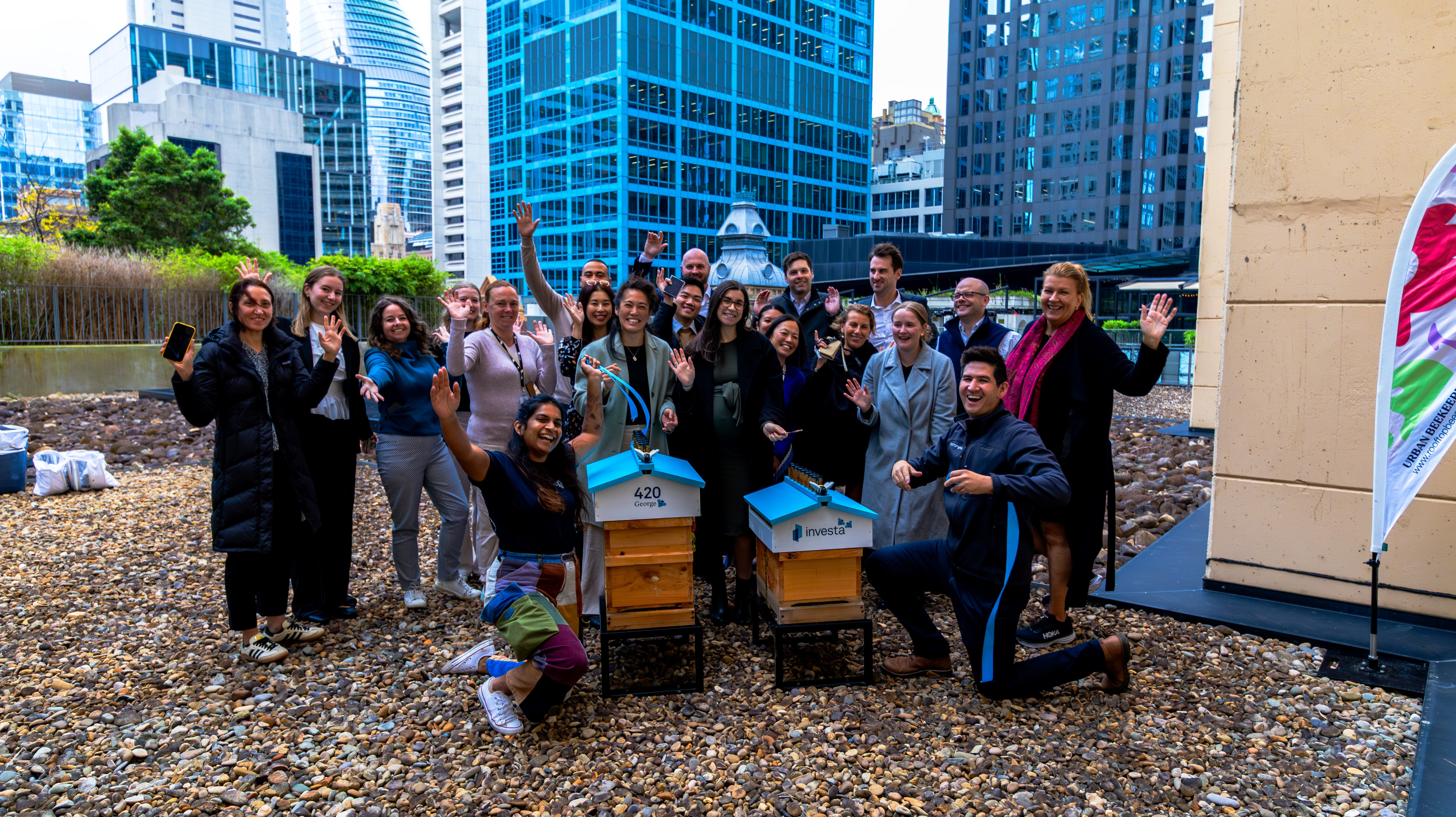 The Investa and Rooftop Bees team celebrate the installation of the new beehives
